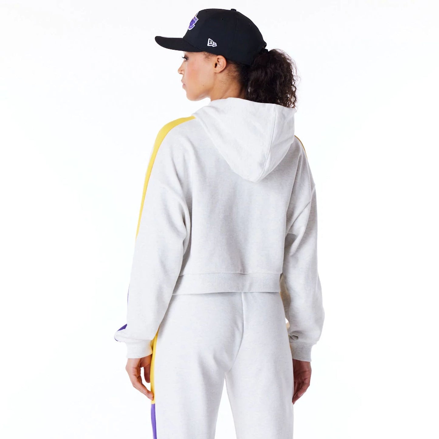 The Female model is wearing LA Lakers Womens NBA Colour Block Grey Pullover Hoodie 3