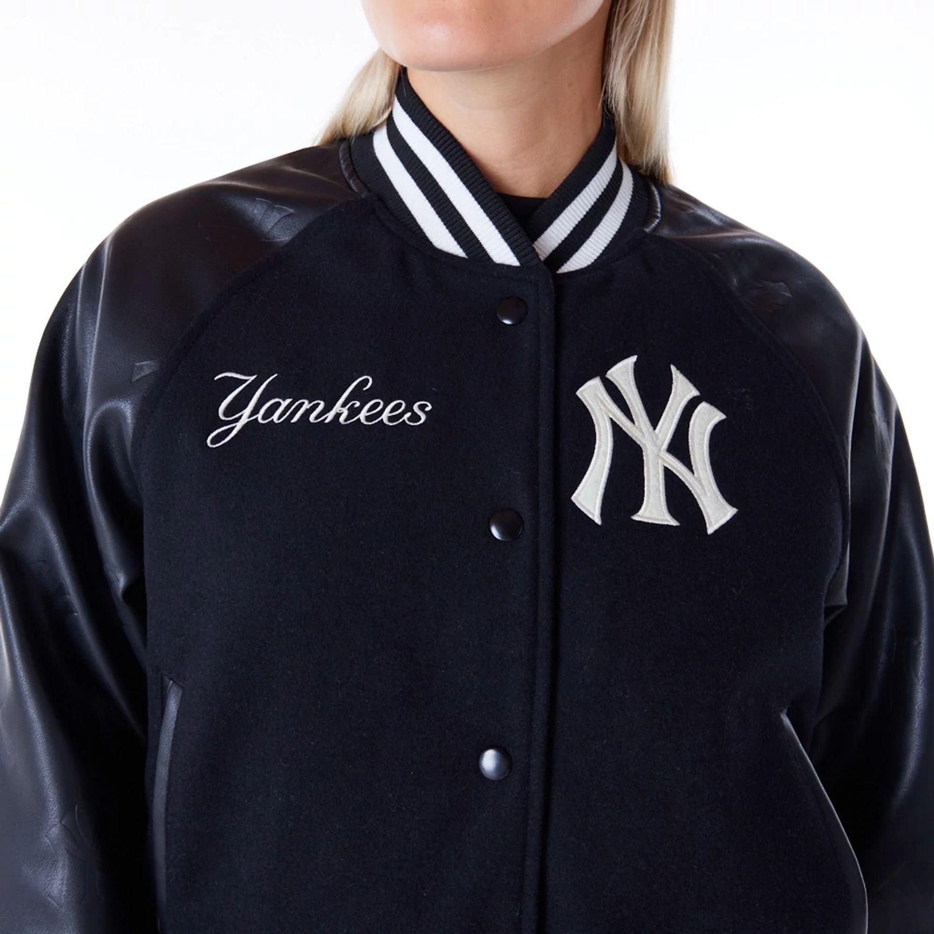 The Female model is wearing New York Yankees Womens MLB Black Varsity Jacket 7