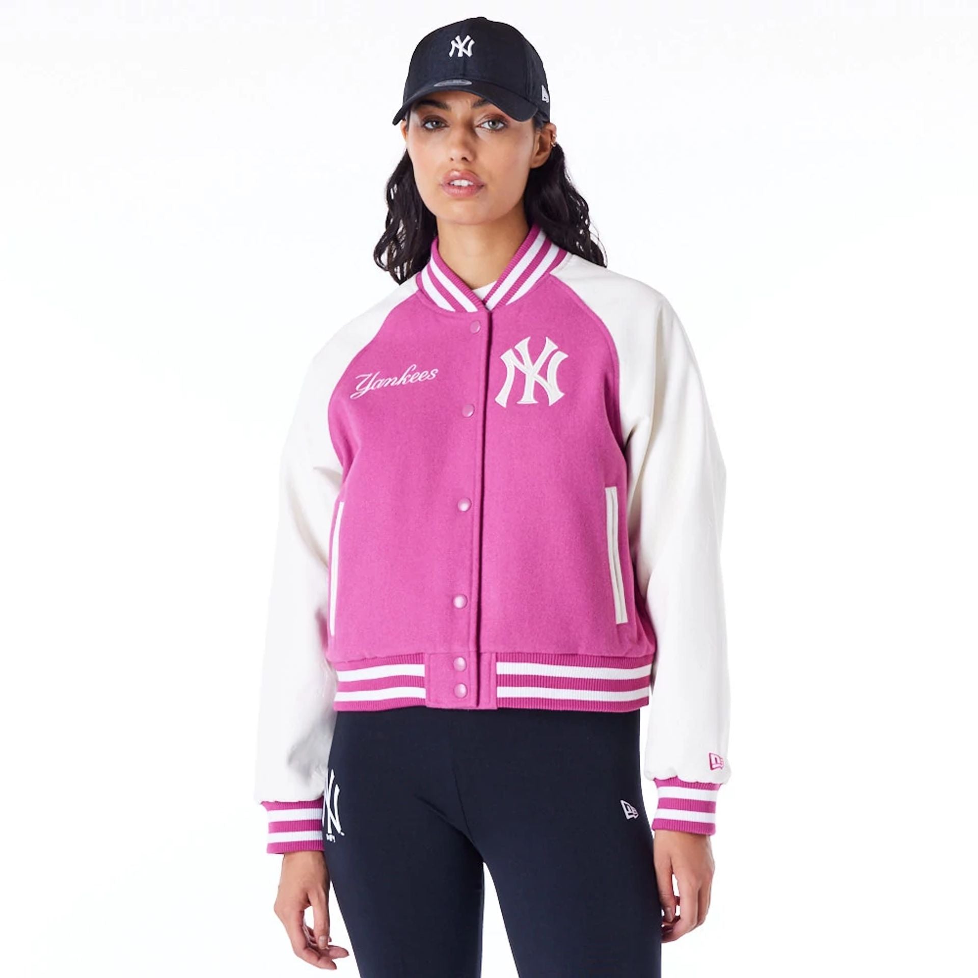 The Female model is wearing New York Yankees Womens MLB Purple Varsity Jacket 1