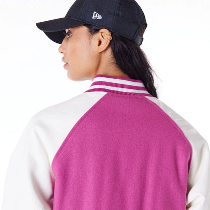 The Female model is wearing New York Yankees Womens MLB Purple Varsity Jacket 4