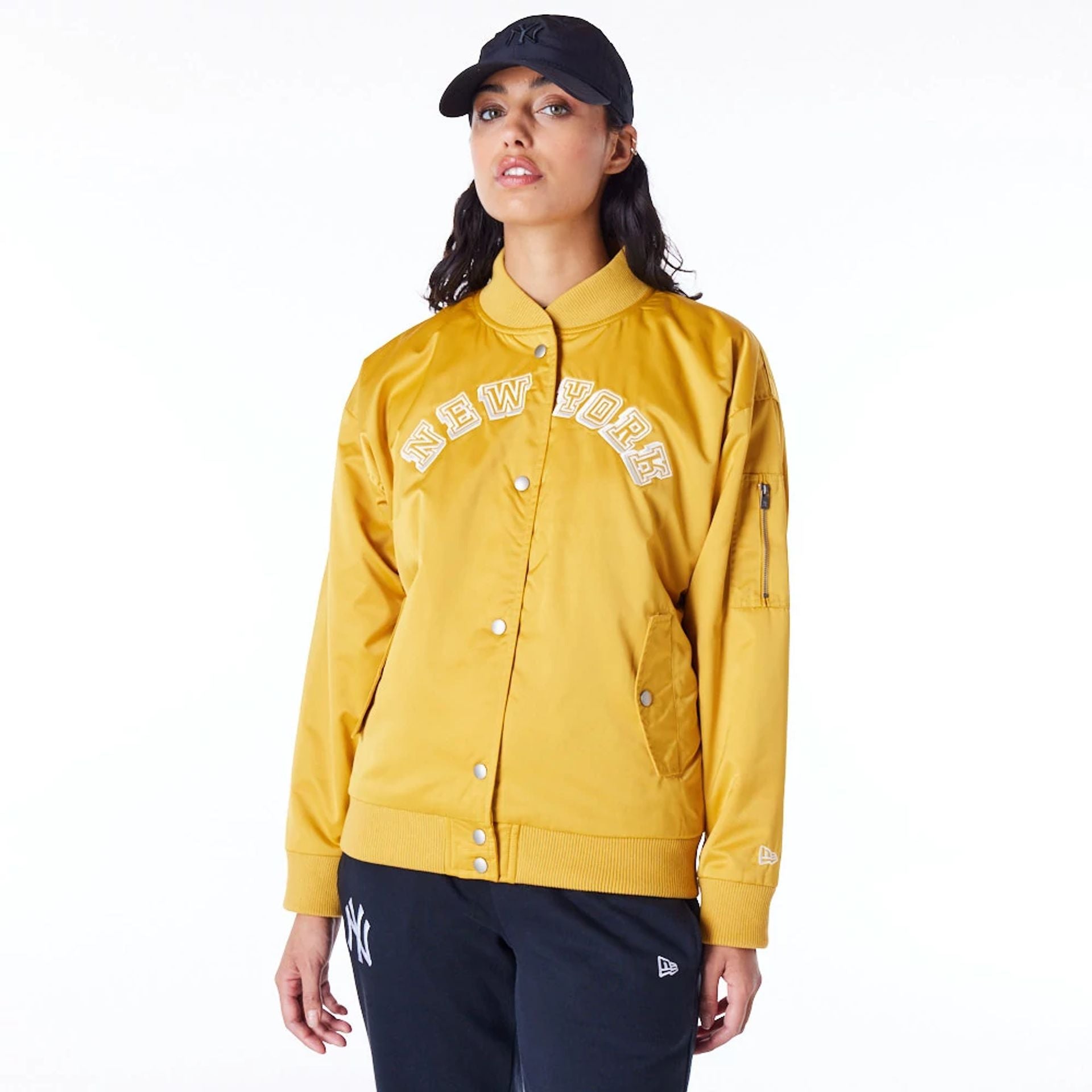 The Female model is wearing New York Yankees Womens MLB Dark Yellow Bomber Jacket 1