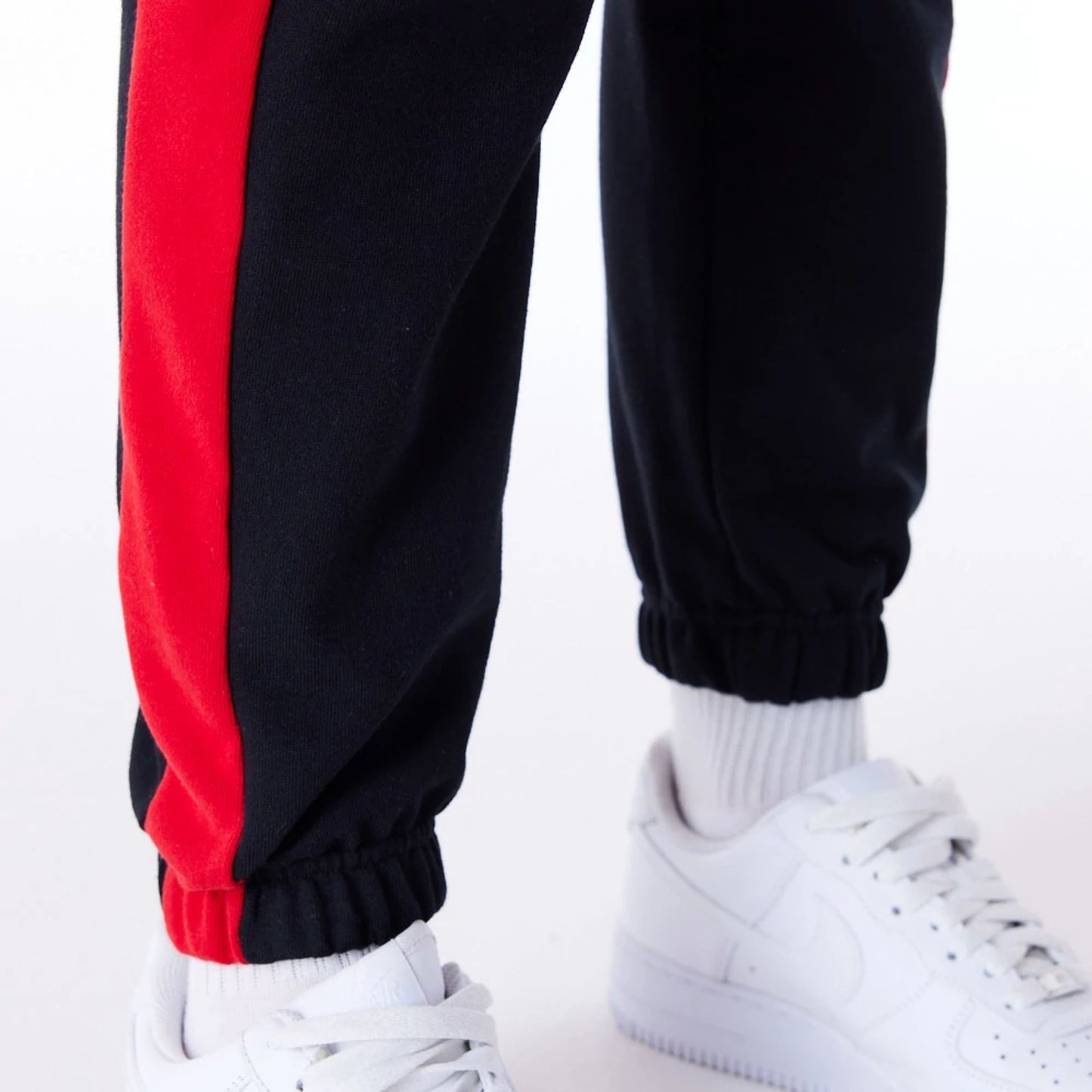 The Female model is wearing Chicago Bulls Womens NBA Colour Block Black Fleece Joggers 7