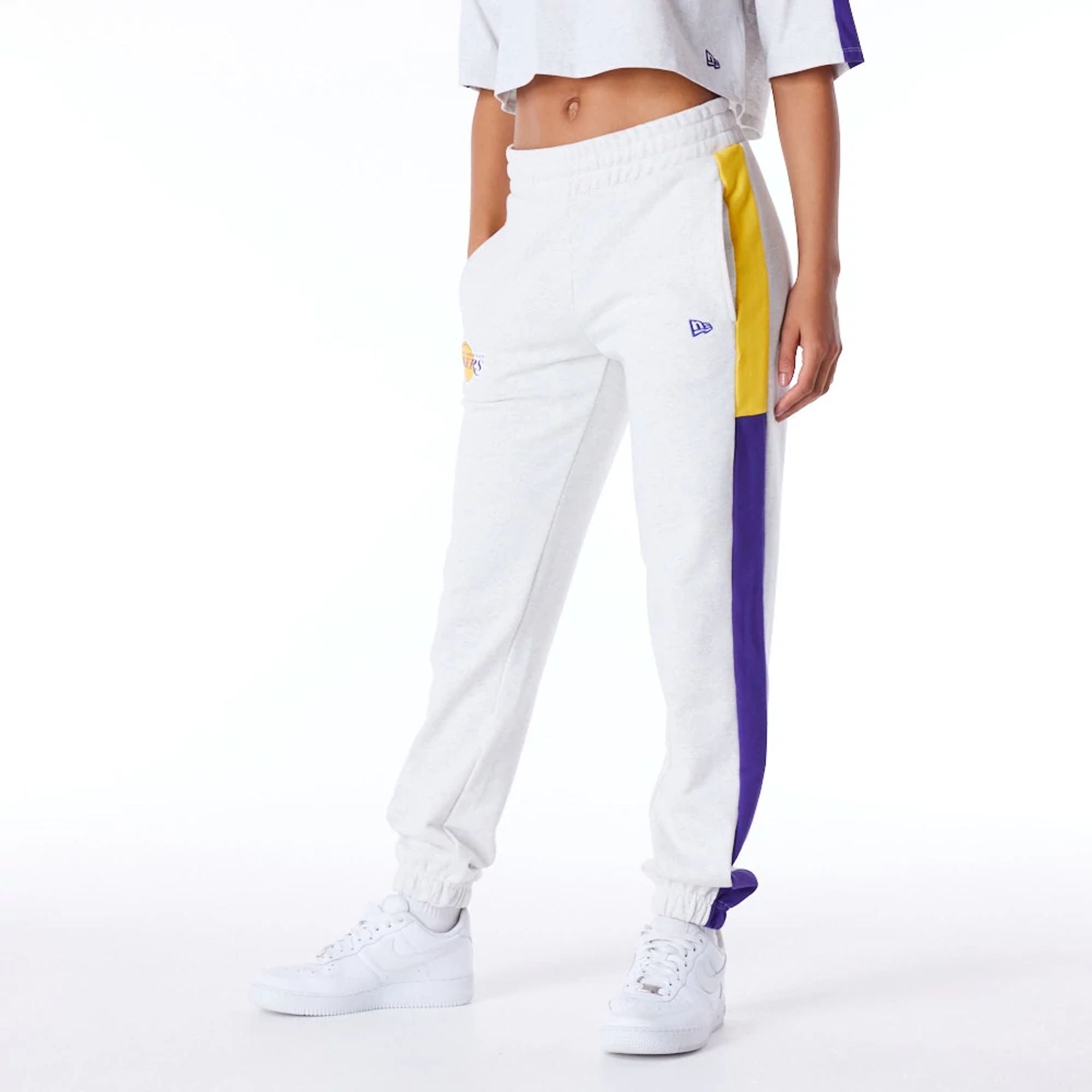 The Female model is wearing LA Lakers Womens NBA Colour Block Grey Fleece Joggers 7