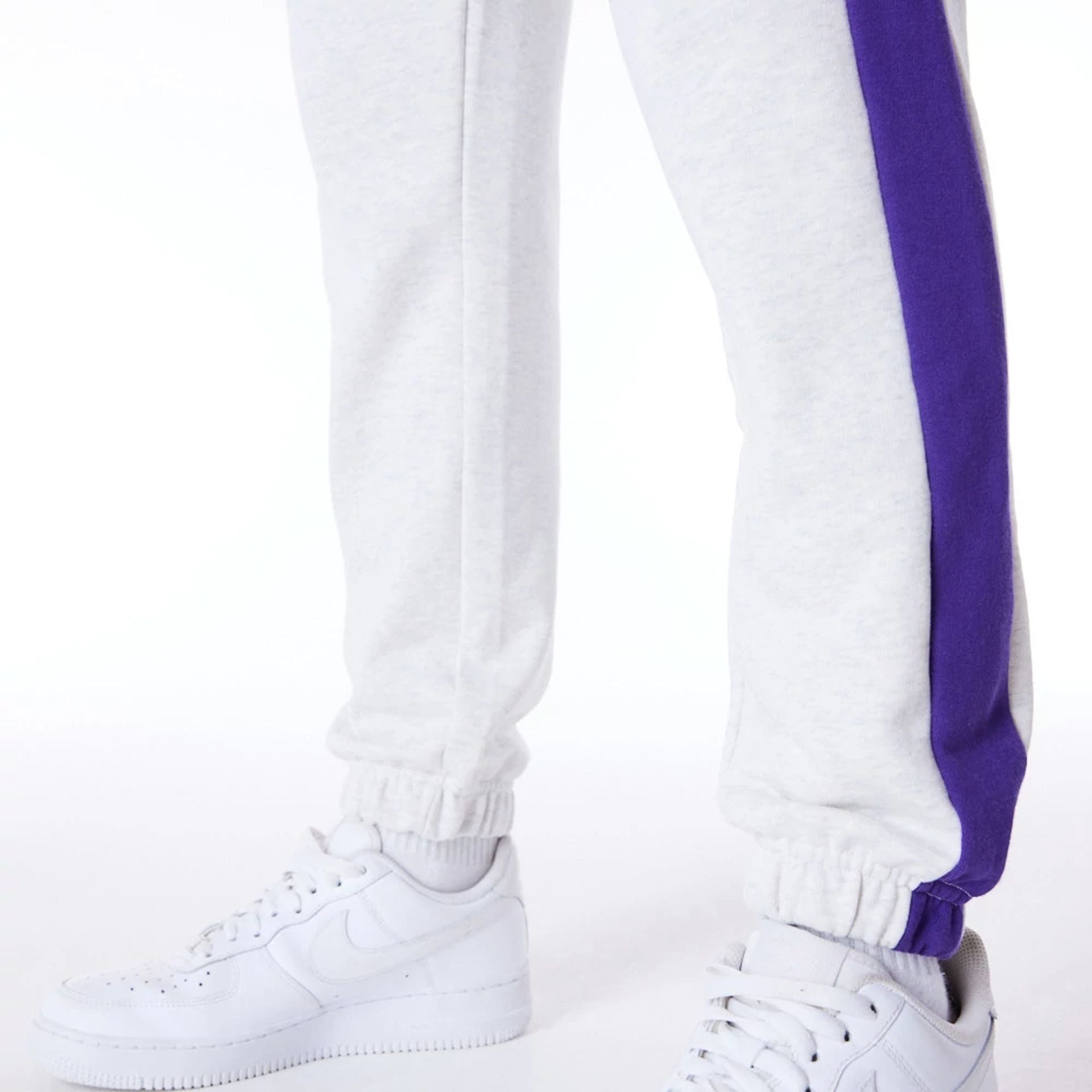 The Female model is wearing LA Lakers Womens NBA Colour Block Grey Fleece Joggers 5