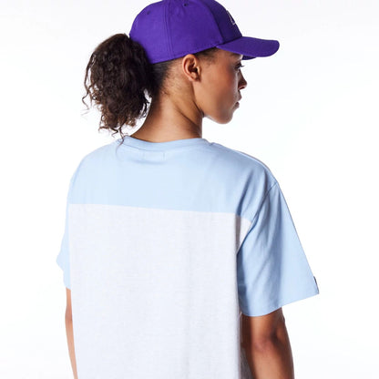 The Female model is wearing LA Lakers Womens NBA Pastel Blue Oversized T-Shirt 7