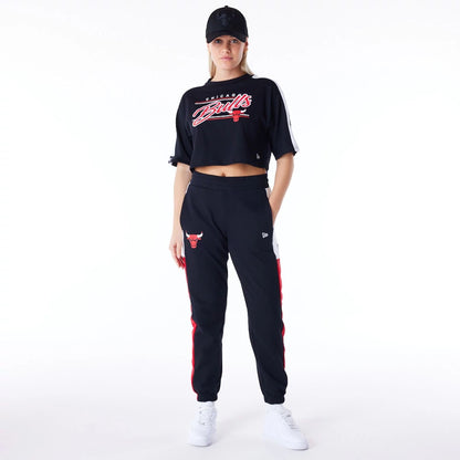 The Female model is wearing Chicago Bulls Womens NBA Colour Block Black Crop T-Shirt 3