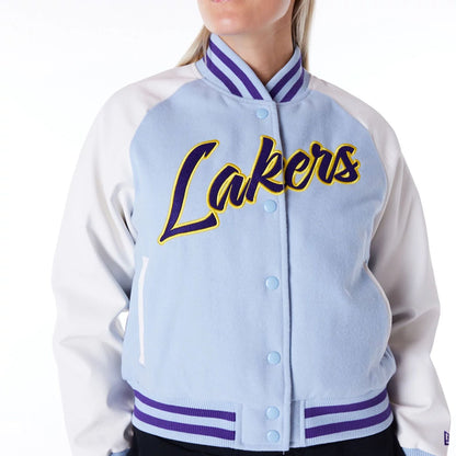 The Female model is wearing LA Lakers Womens NBA Pastel Blue Varsity Jacket 7