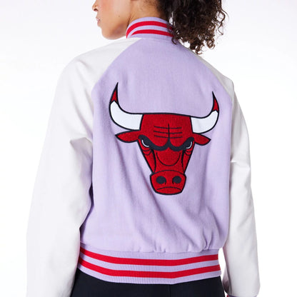 The Female model is wearing Chicago Bulls Womens NBA Pastel Purple Varsity Jacket 4