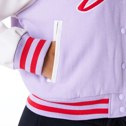 The Female model is wearing Chicago Bulls Womens NBA Pastel Purple Varsity Jacket 8