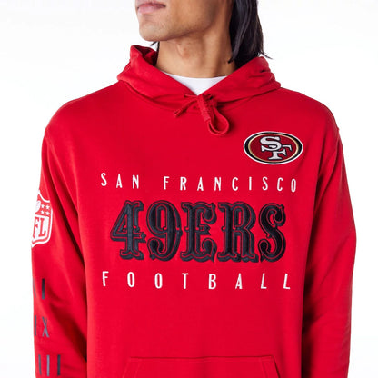 The Male model is wearing San Francisco 49ers NFL Patch Red Oversized Pullover Hoodie 9