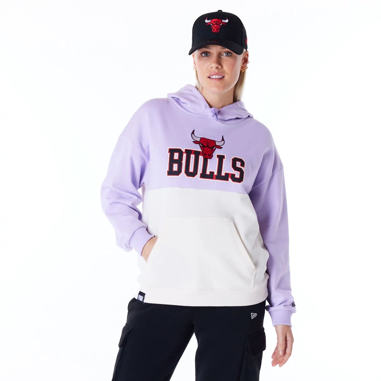 The Female model is wearing Chicago Bulls Womens NBA Pastel Purple Oversized Pullover Hoodie 1