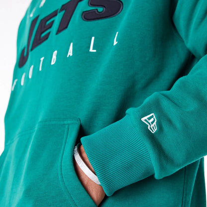 The Male model is wearing New York Jets NFL Patch Green Oversized Pullover Hoodie 2