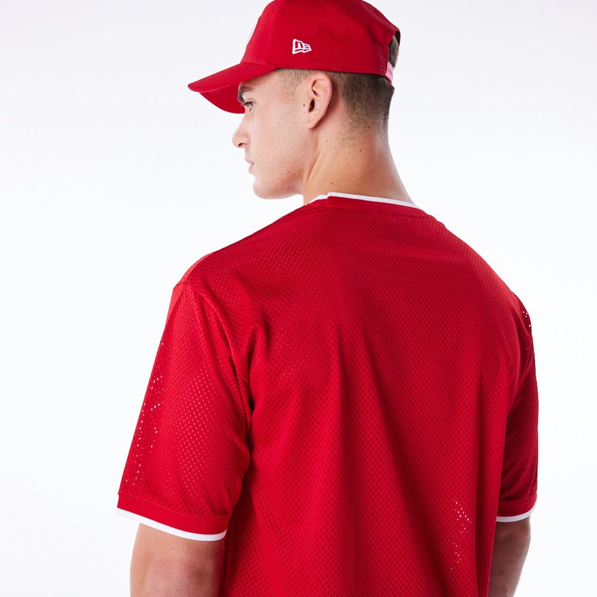 The Male model is wearing San Francisco 49ers NFL Mesh Red Oversized T-Shirt 7