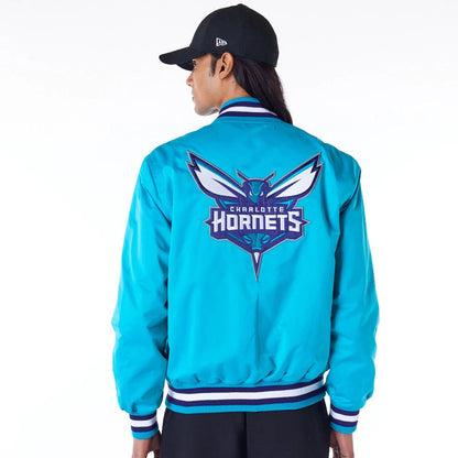 The Male model is wearing Charlotte Hornets NBA Satin Turquoise Bomber Jacket 9