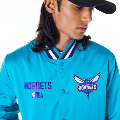 The Male model is wearing Charlotte Hornets NBA Satin Turquoise Bomber Jacket 8