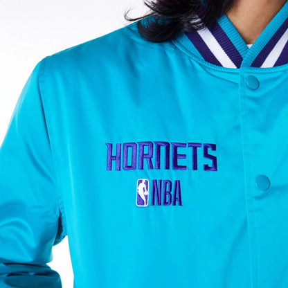 The Male model is wearing Charlotte Hornets NBA Satin Turquoise Bomber Jacket 3