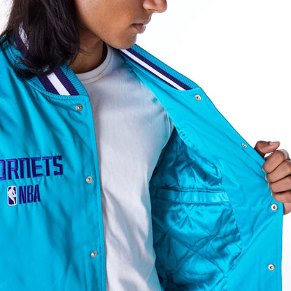 The Male model is wearing Charlotte Hornets NBA Satin Turquoise Bomber Jacket 5