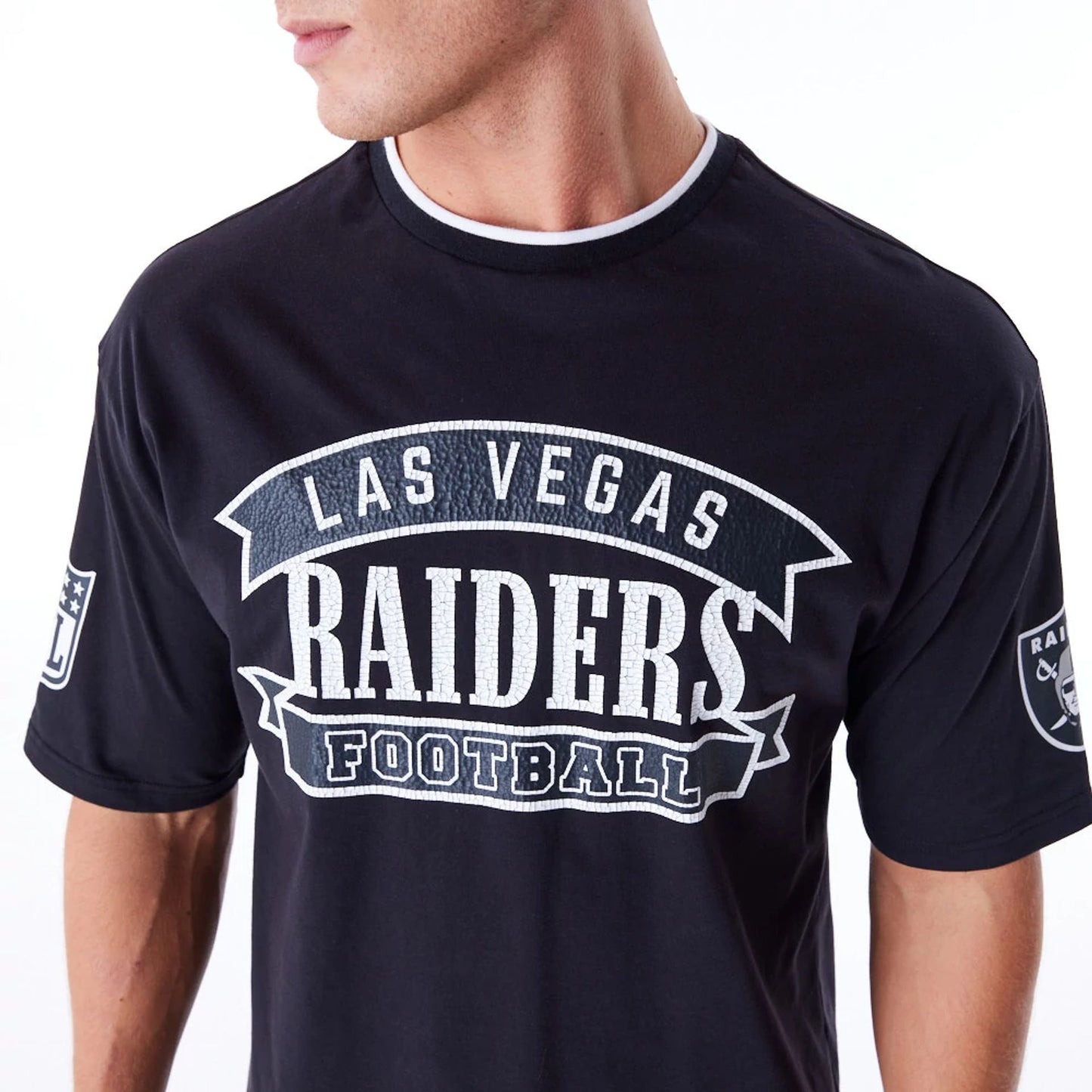 The Male model is wearing Las Vegas Raiders NFL Graphic Black Oversized T-Shirt 6