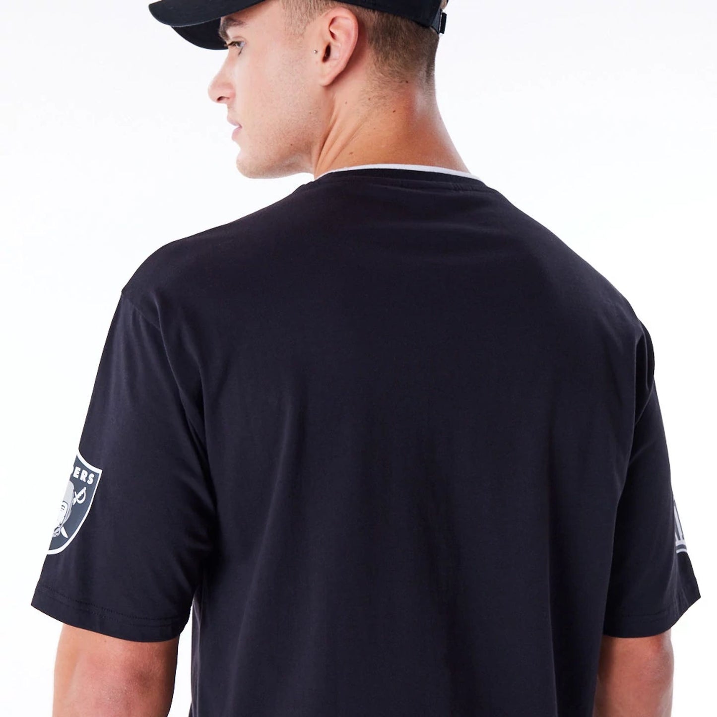 The Male model is wearing Las Vegas Raiders NFL Graphic Black Oversized T-Shirt 5