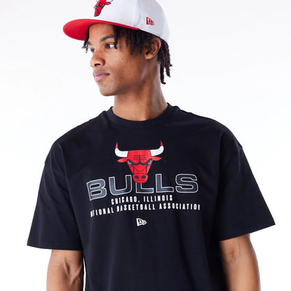 The Male model is wearing Chicago Bulls NBA Tech Black Oversized T-Shirt 5