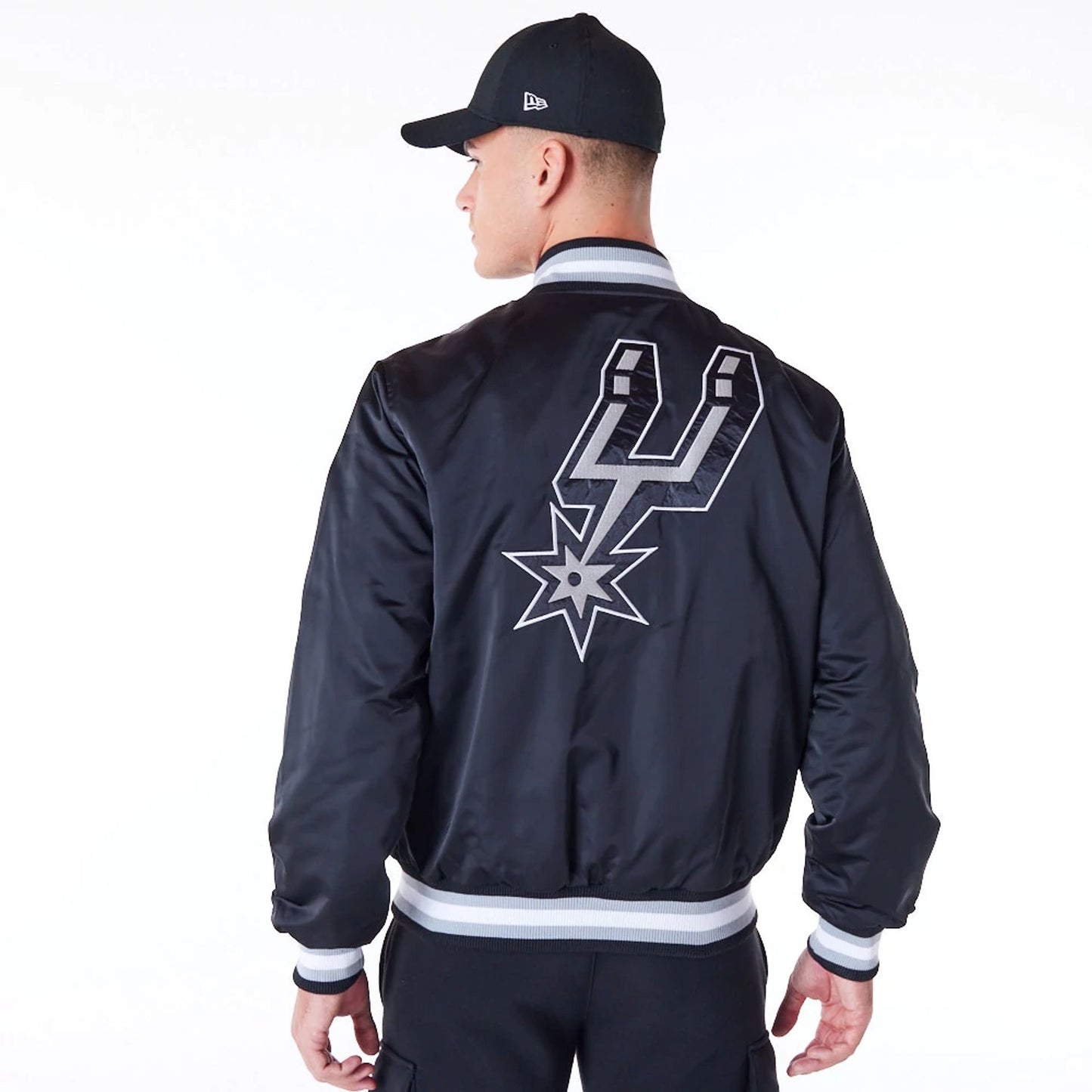 The Male model is wearing San Antonio Spurs NBA Satin Black Bomber Jacket 9