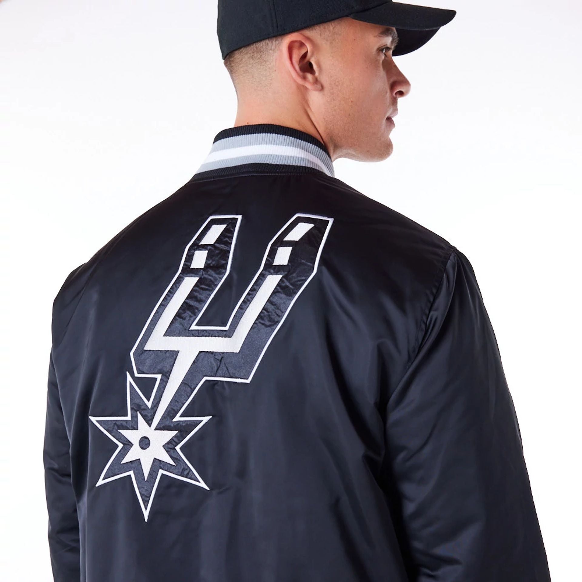 The Male model is wearing San Antonio Spurs NBA Satin Black Bomber Jacket 8