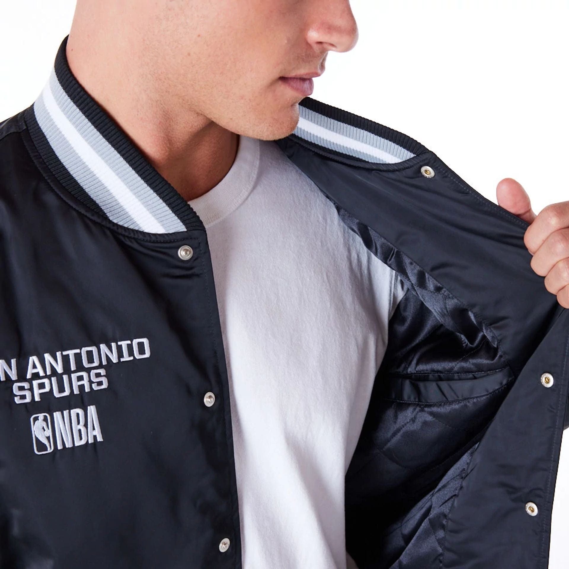 The Male model is wearing San Antonio Spurs NBA Satin Black Bomber Jacket 4