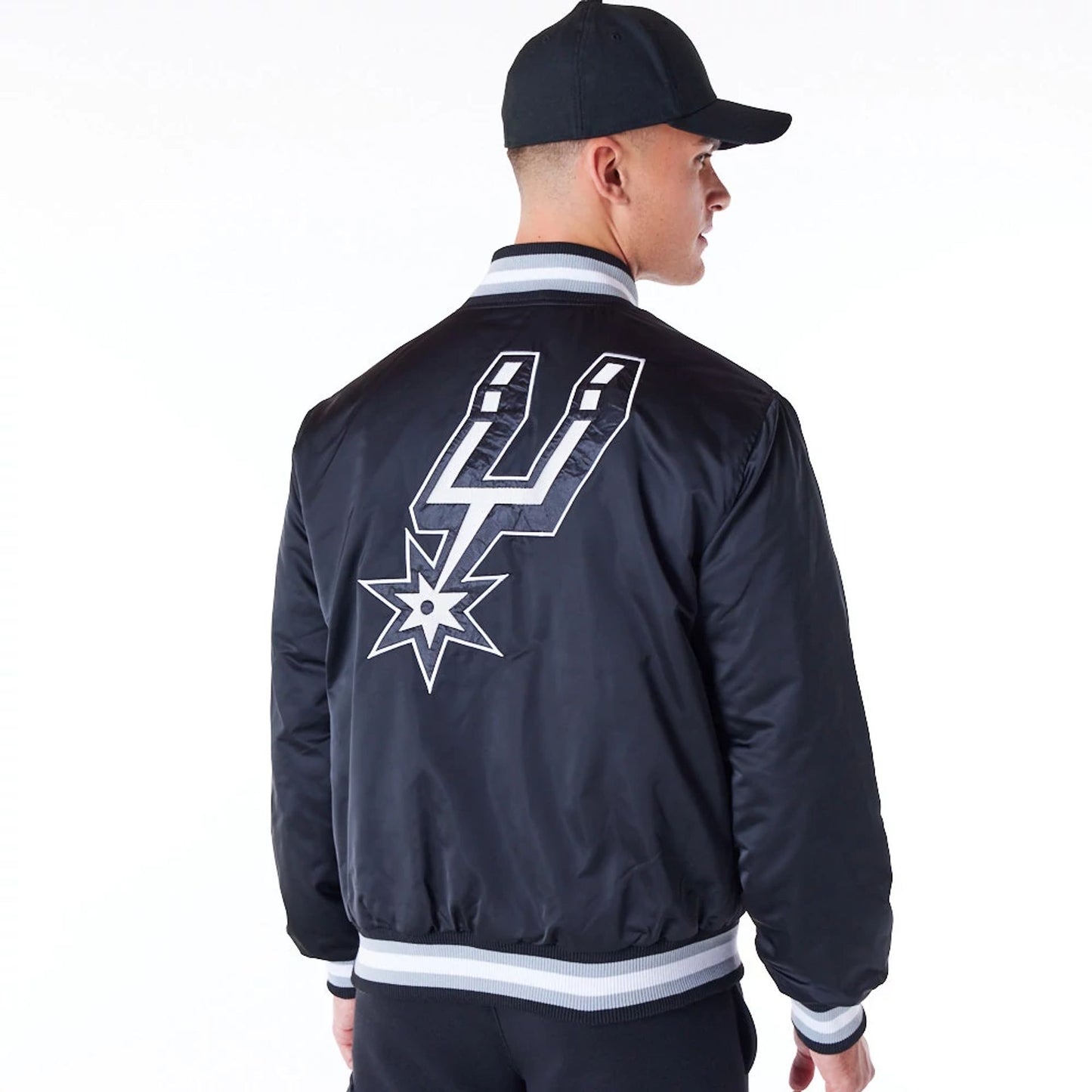 The Male model is wearing San Antonio Spurs NBA Satin Black Bomber Jacket 2