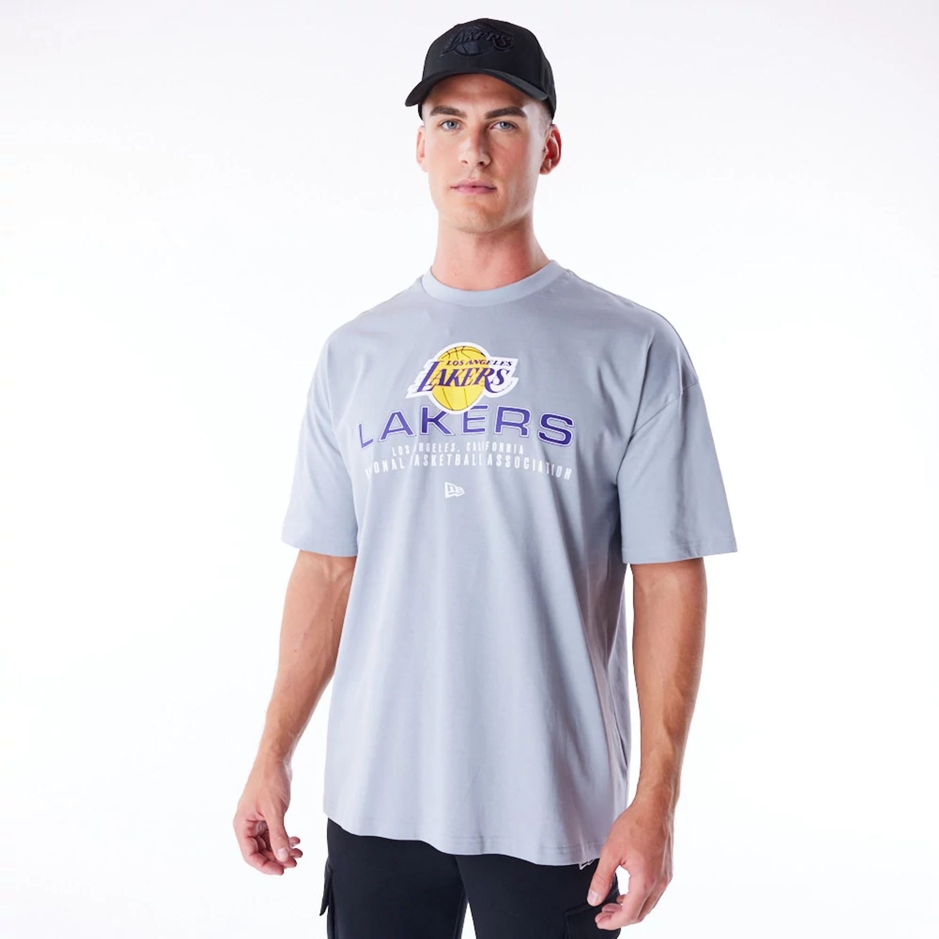 The Male model is wearing LA Lakers NBA Tech Grey Oversized T-Shirt 1