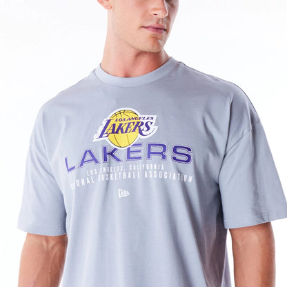 The Male model is wearing LA Lakers NBA Tech Grey Oversized T-Shirt 5