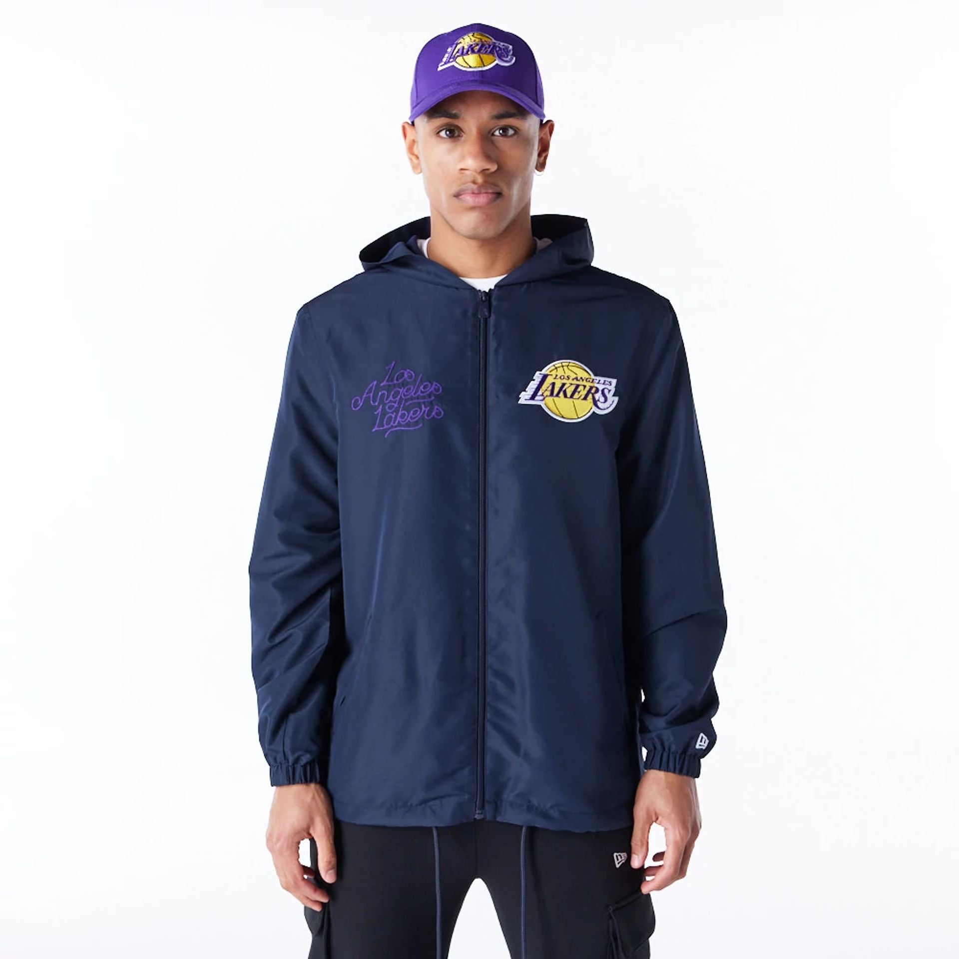 The Male model is wearing LA Lakers NBA Graphic Navy Jacket 1