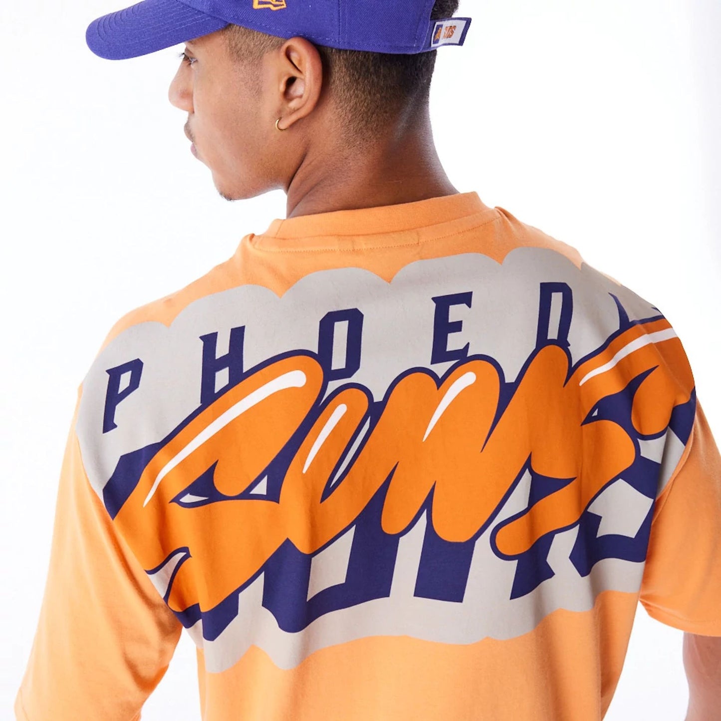 The Male model is wearing Phoenix Suns NBA Wordmark Orange Oversized T-Shirt 7