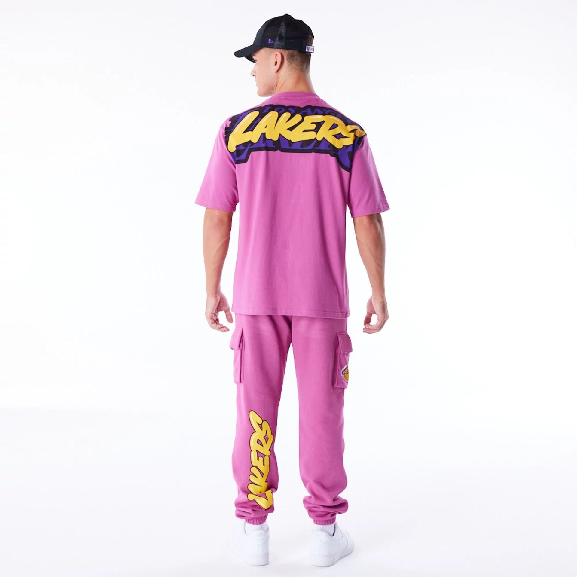 The Male model is wearing LA Lakers NBA Wordmark Purple Oversized T-Shirt 2