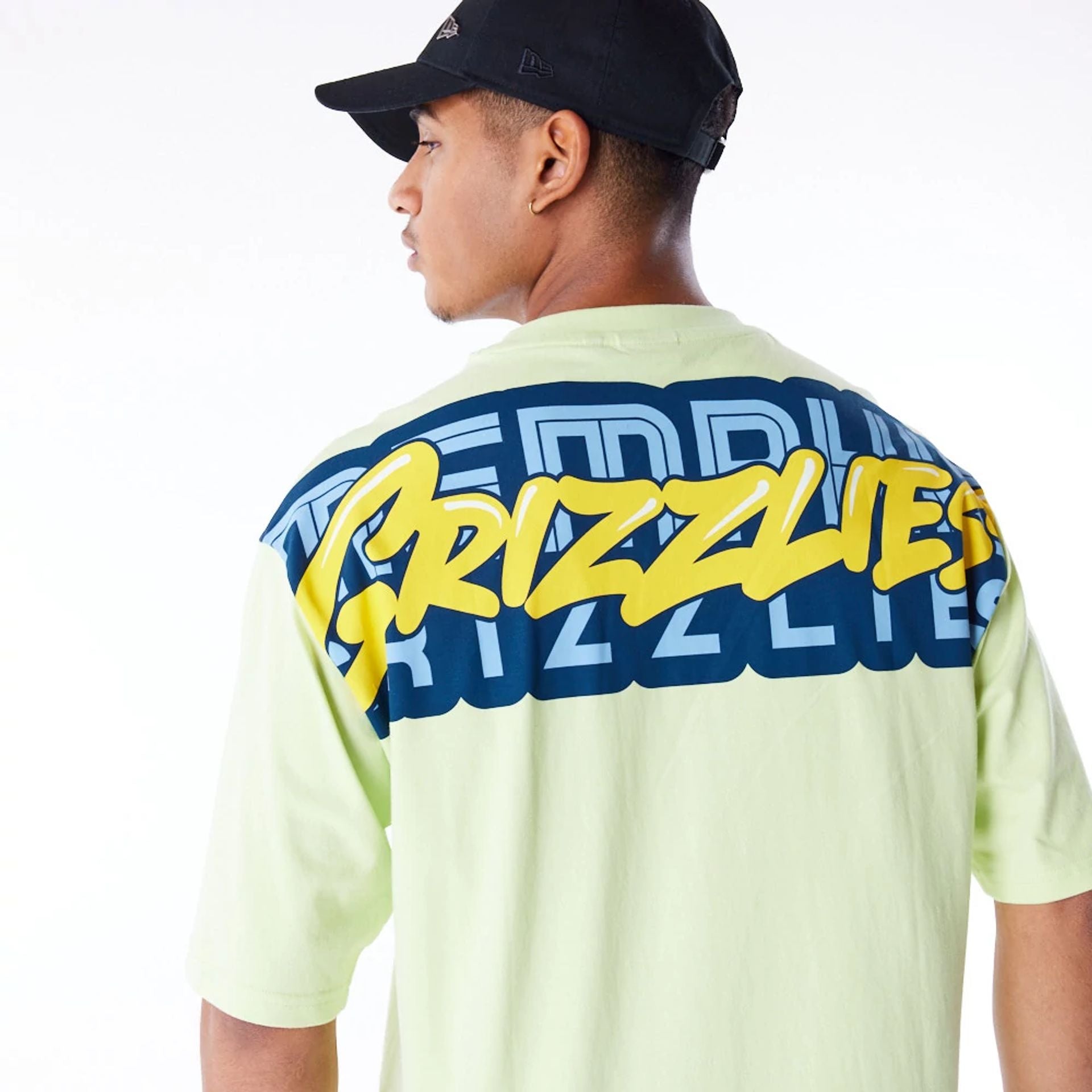 The Male model is wearing Memphis Grizzlies NBA Wordmark Pastel Green Oversized T-Shirt 4