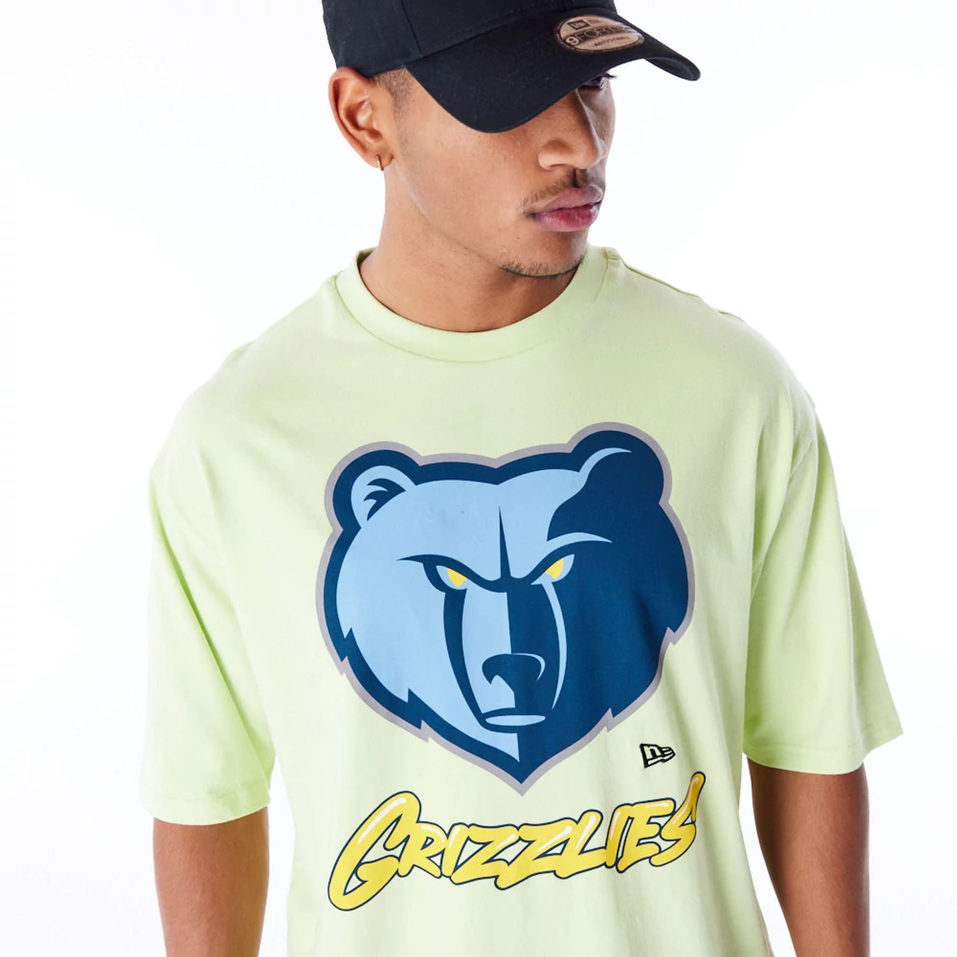 The Male model is wearing Memphis Grizzlies NBA Wordmark Pastel Green Oversized T-Shirt 5