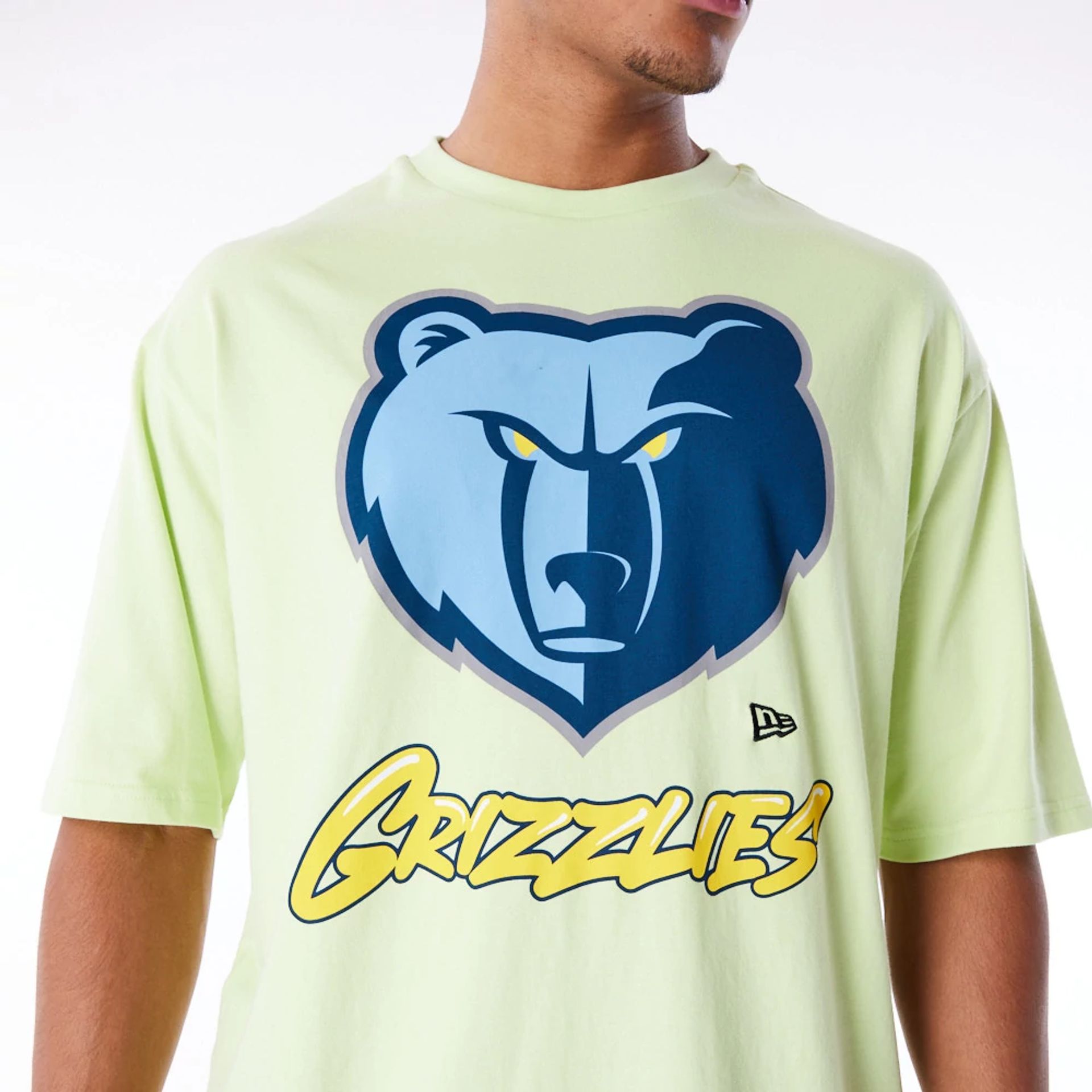 The Male model is wearing Memphis Grizzlies NBA Wordmark Pastel Green Oversized T-Shirt 2