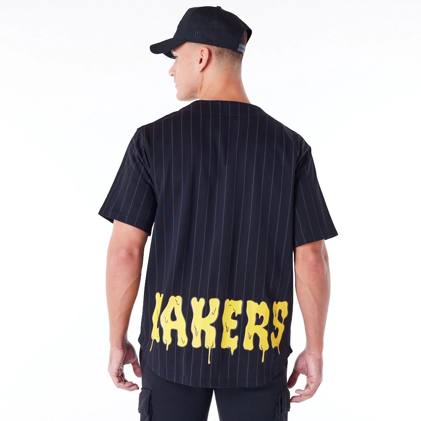 The Male model is wearing LA Lakers NBA Graphic Black Jersey 5