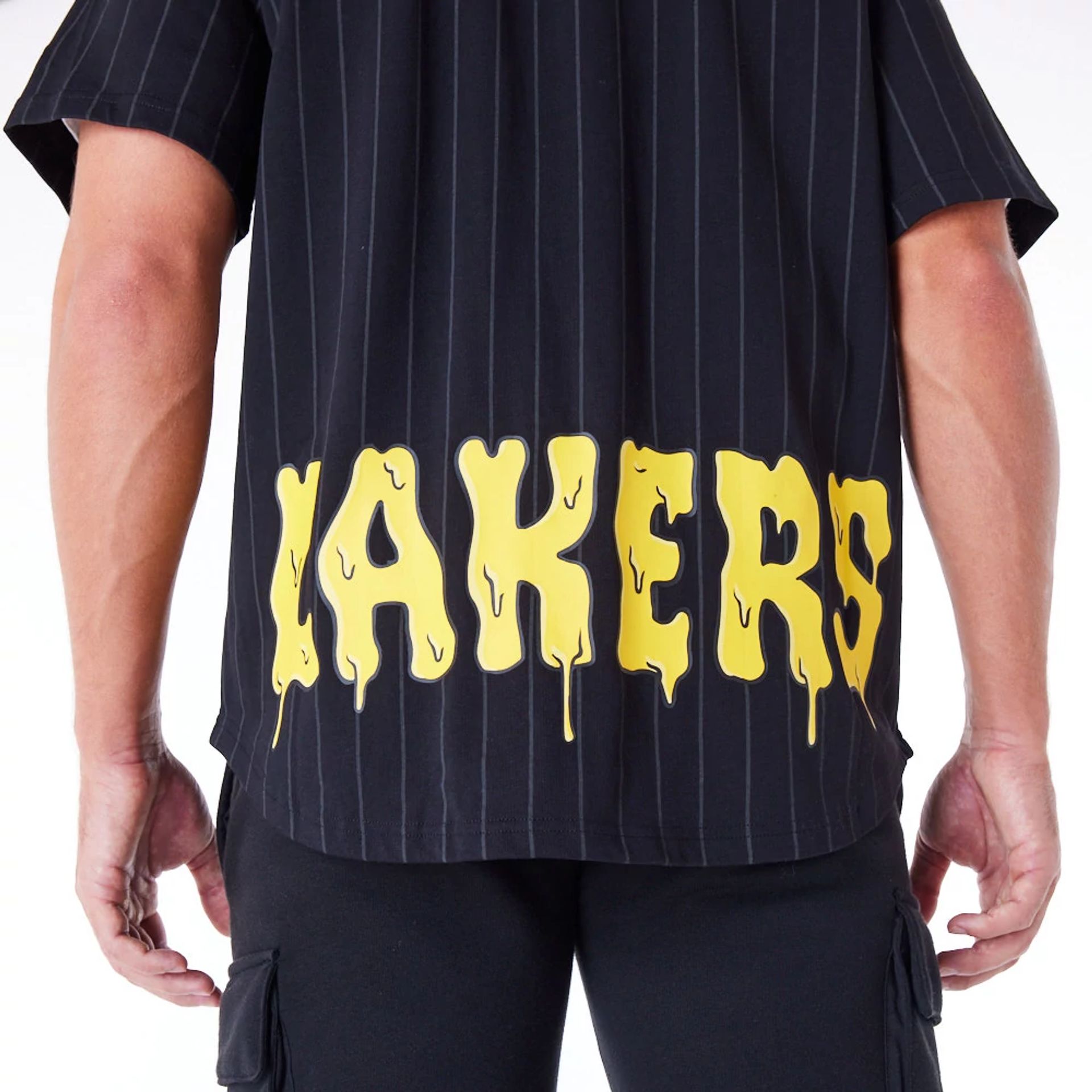 The Male model is wearing LA Lakers NBA Graphic Black Jersey 2