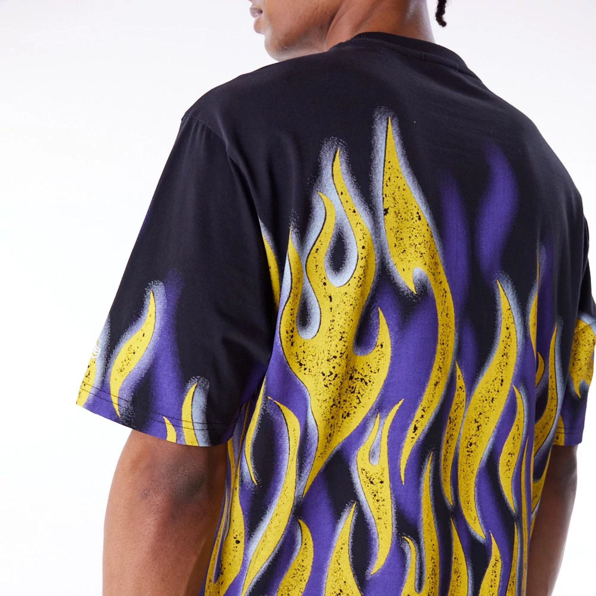 The Male model is wearing LA Lakers NBA Flame Black Oversized T-Shirt 2