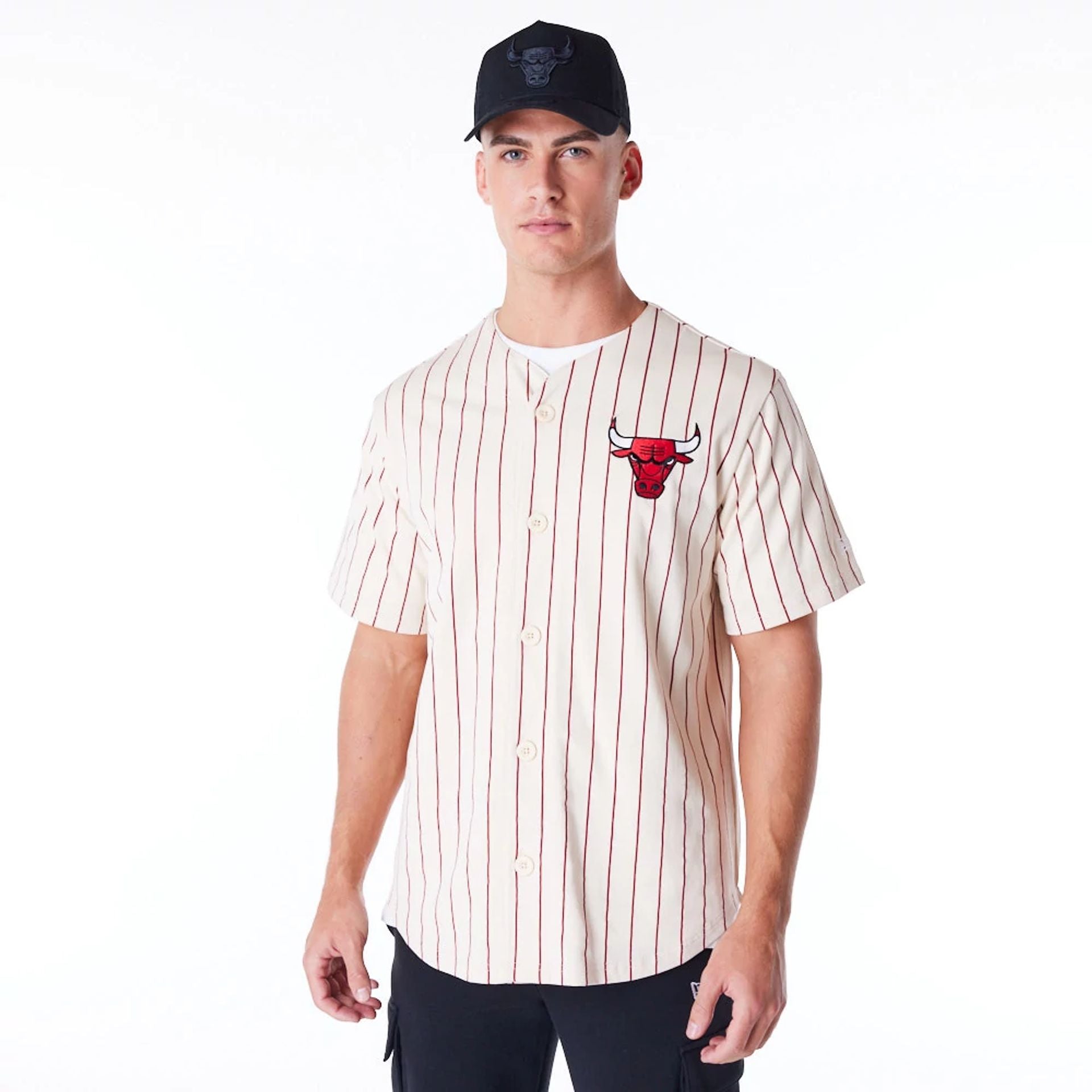 The Male model is wearing Chicago Bulls NBA Graphic Stone Jersey 1