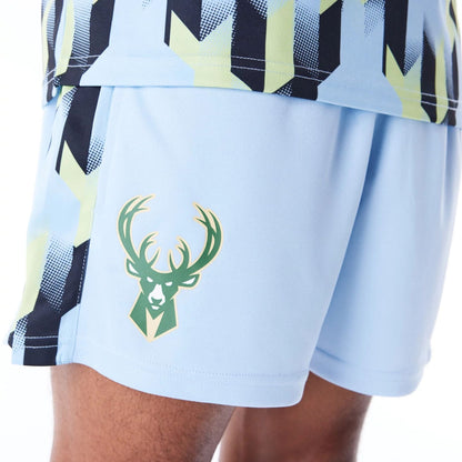 The Male model is wearing Milwaukee Bucks NBA Soccer Pastel Blue Short Shorts 7