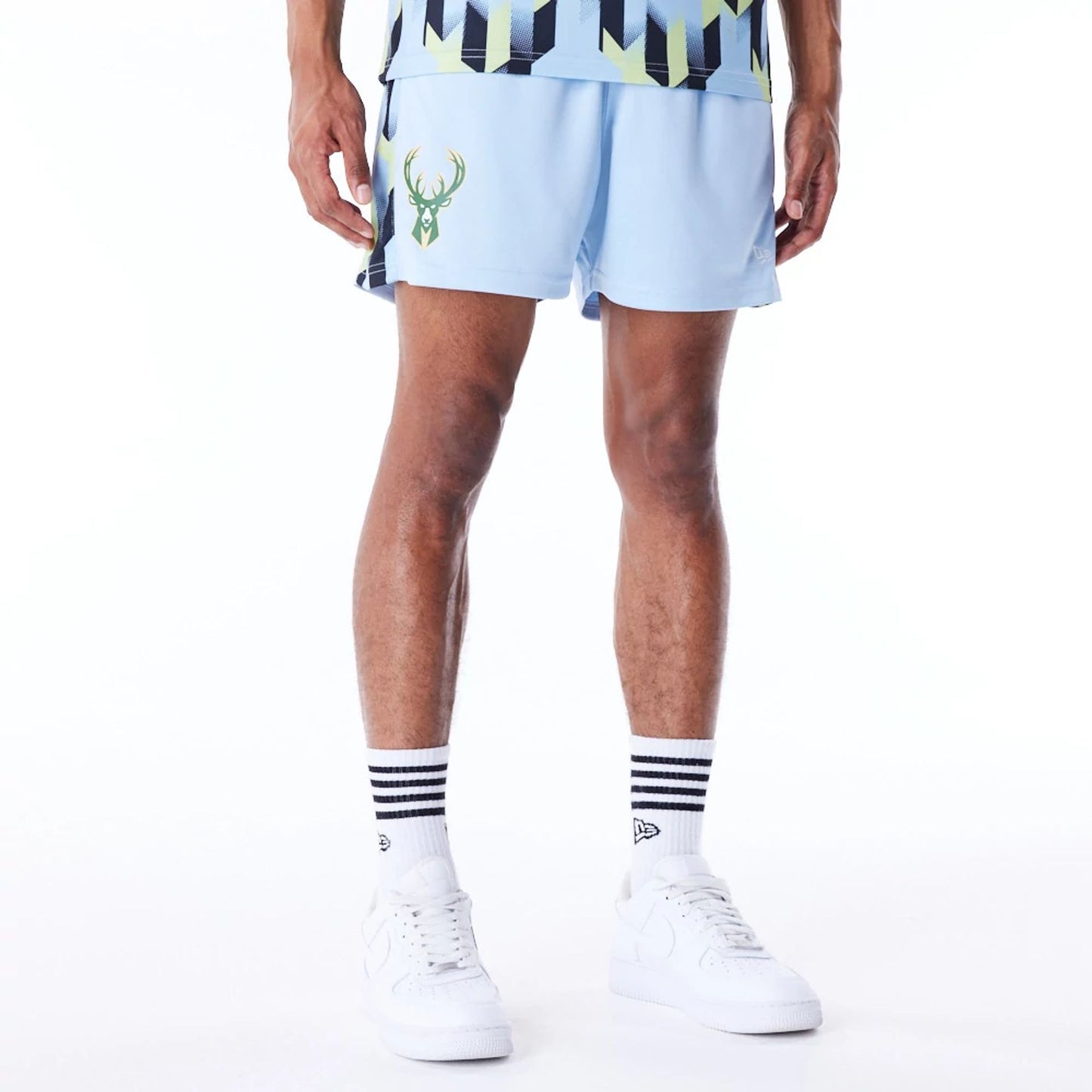 The Male model is wearing Milwaukee Bucks NBA Soccer Pastel Blue Short Shorts 8