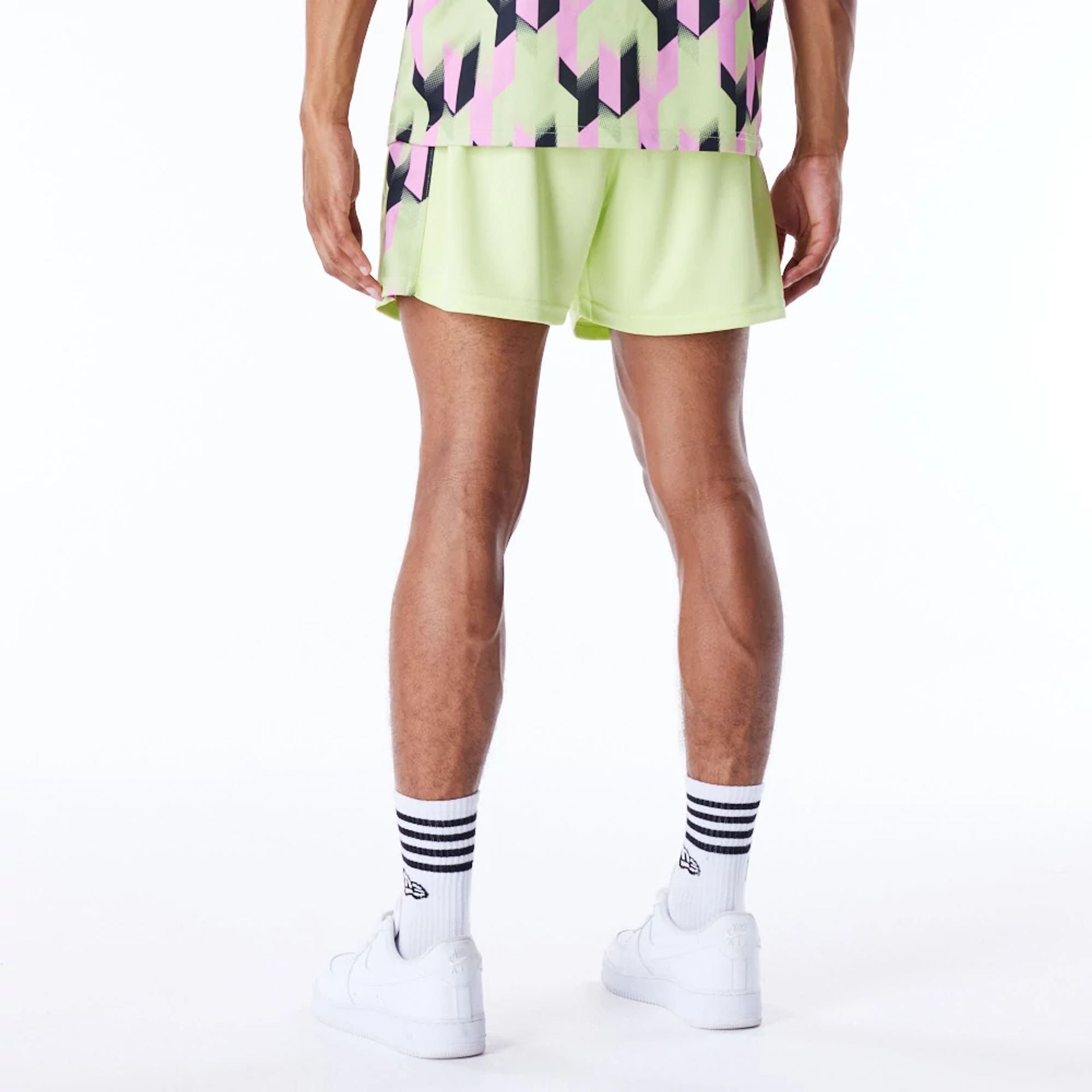 The Male model is wearing Chicago Bulls NBA Soccer Pastel Green Short Shorts 5