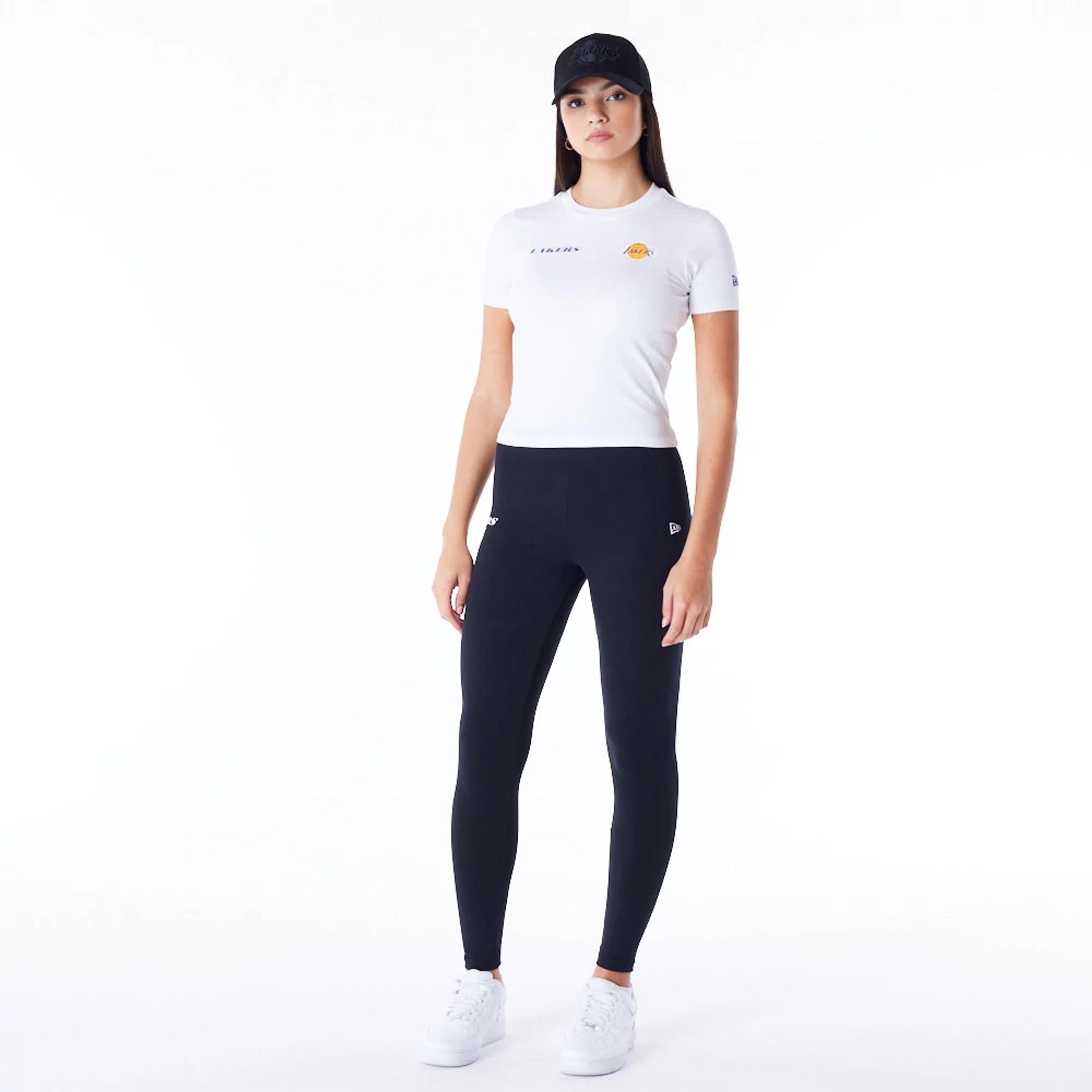 The Female model is wearing LA Lakers Womens NBA Team Logo Wordmark Black Leggings 4