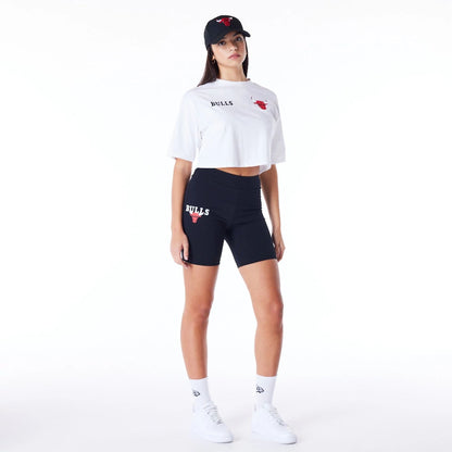 The Female model is wearing Chicago Bulls Womens NBA Team Logo Wordmark White Crop T-Shirt 2