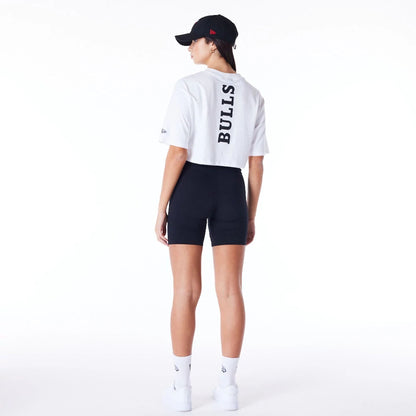 The Female model is wearing Chicago Bulls Womens NBA Team Logo Wordmark White Crop T-Shirt 3