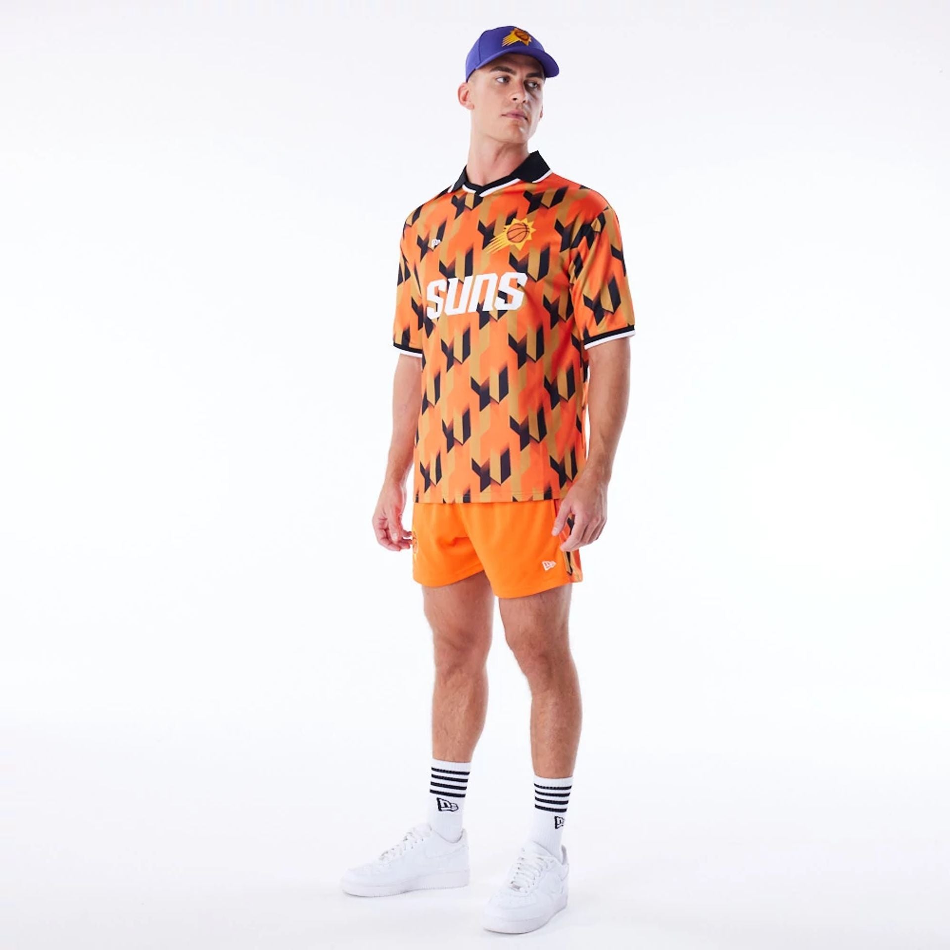 The Male model is wearing Phoenix Suns NBA Soccer Orange Short Shorts 3