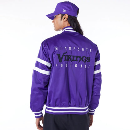 The Male model is wearing Minnesota Vikings NFL Satin Purple Bomber Jacket 7