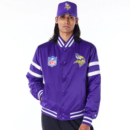 The Male model is wearing Minnesota Vikings NFL Satin Purple Bomber Jacket 1