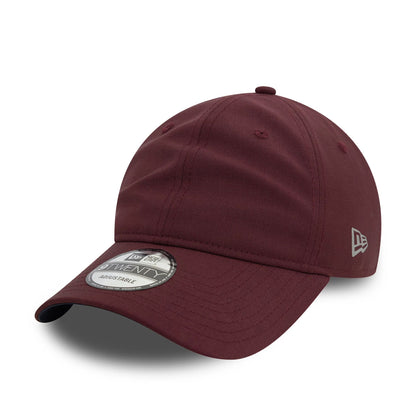 This is a New Era Water Repellent Dark Red 9TWENTY Adjustable Cap 1